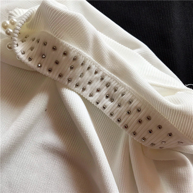 Maglioncini smanicati collier