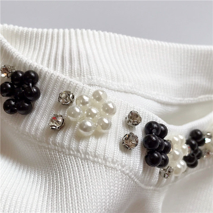 Maglioncini smanicati collier