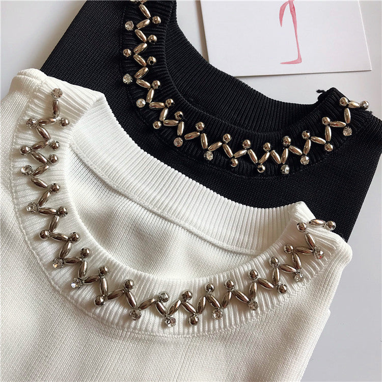 Maglioncini smanicati collier