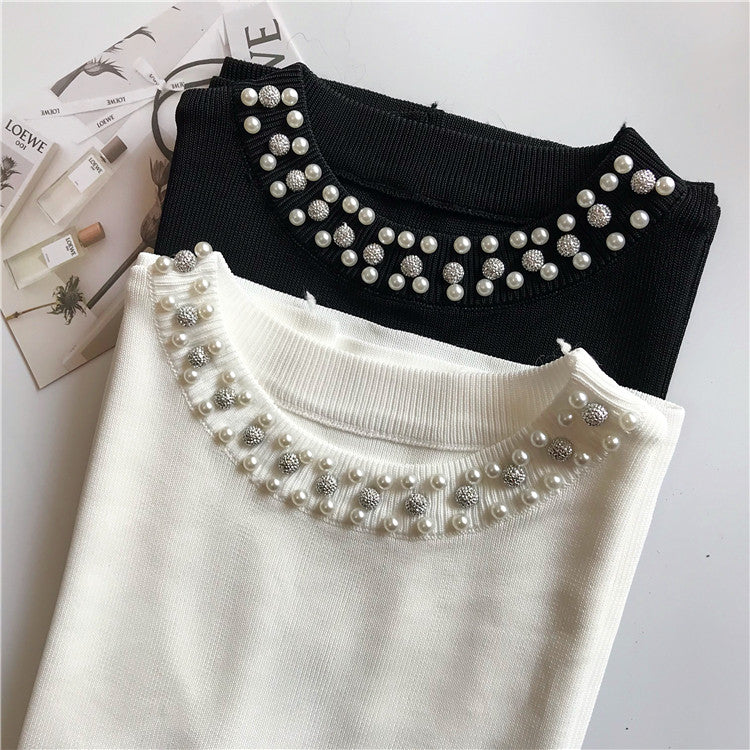 Maglioncini smanicati collier