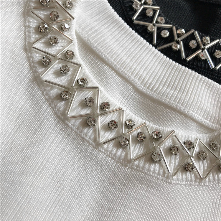 Maglioncini smanicati collier