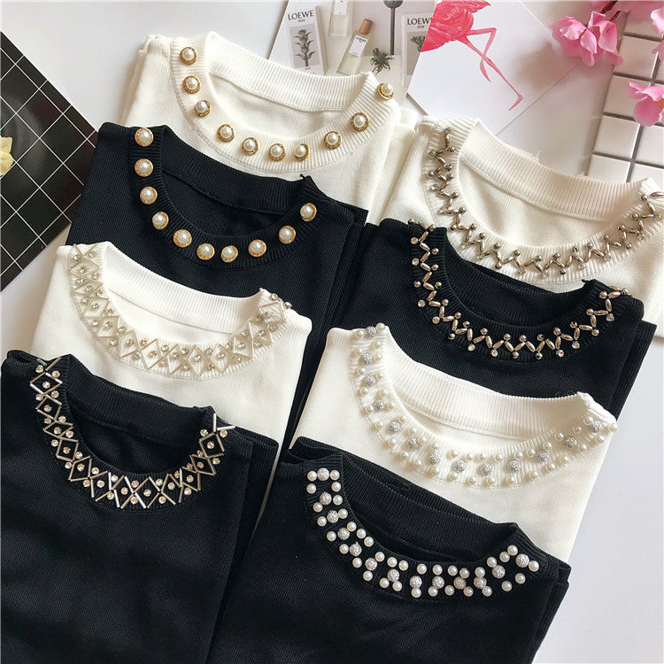 Maglioncini smanicati collier