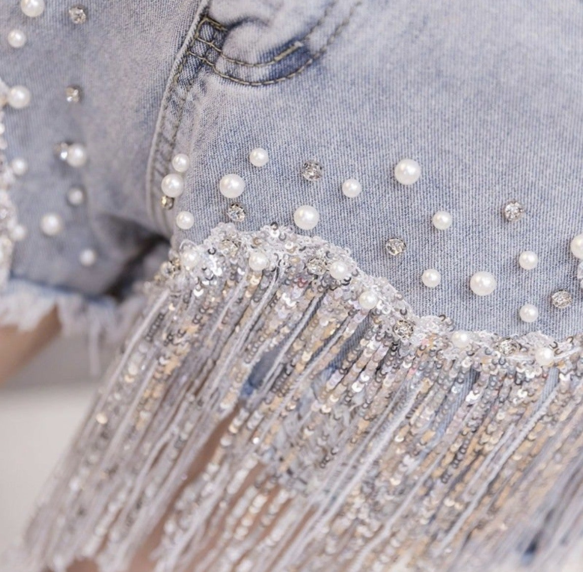 Shorts perle e frange strass