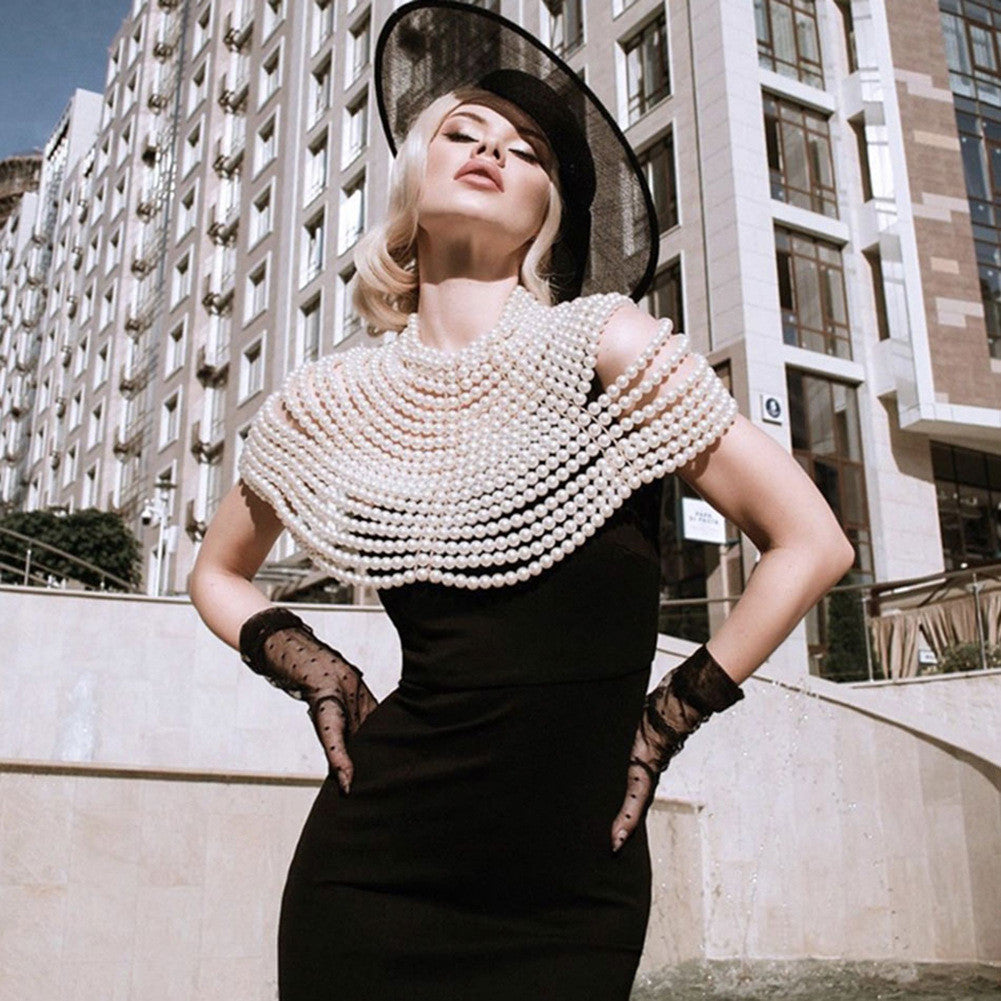 Top-scultura in perle Nyhg