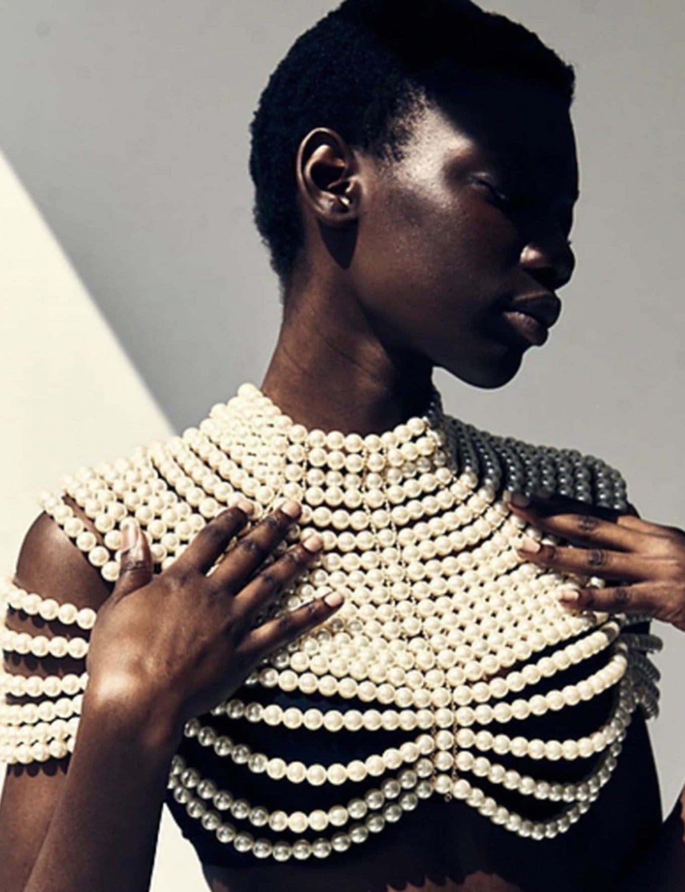 Top-scultura in perle Nyhg