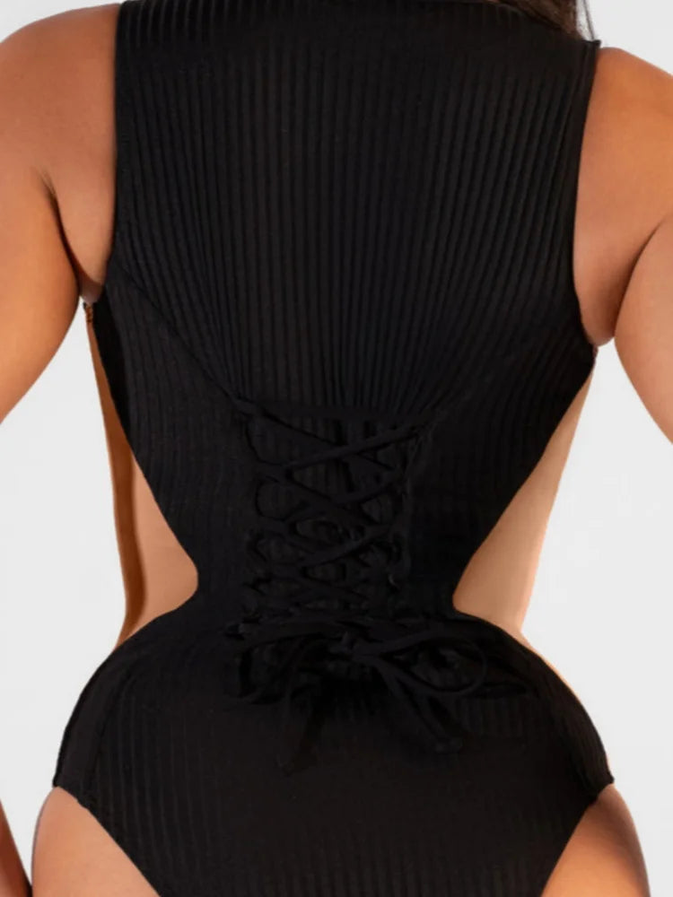 Costume intero modellante Flaresla nero dettaglio vita vespa — Dream Shop