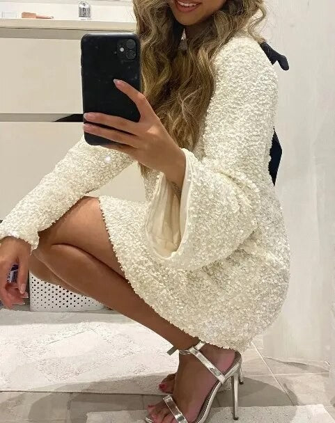 Holiday bow sequindress