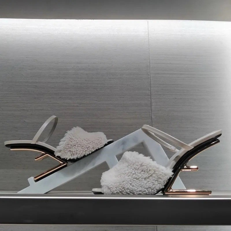 Sandalo peloso tacco invisible