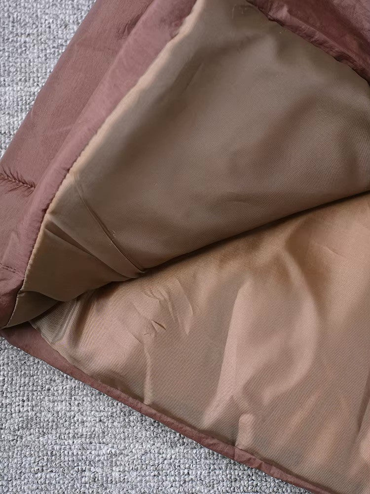 Piumino Tagy con cinta