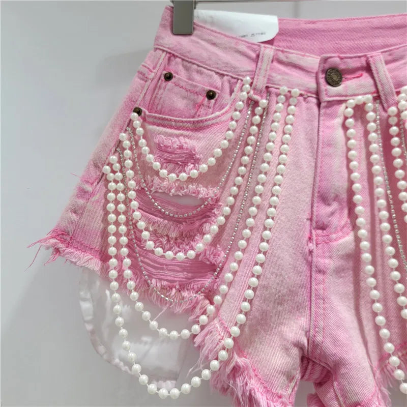 Shorts jeans con catene di perle Pearl Unchain stile western chic