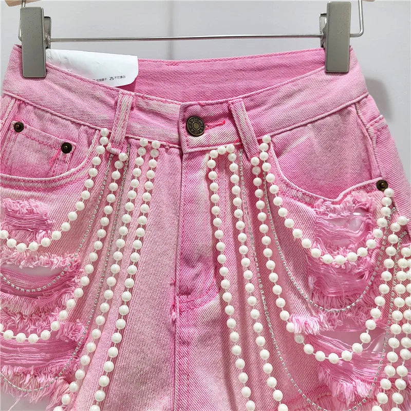 Shorts jeans con catene di perle Pearl Unchain stile western chic