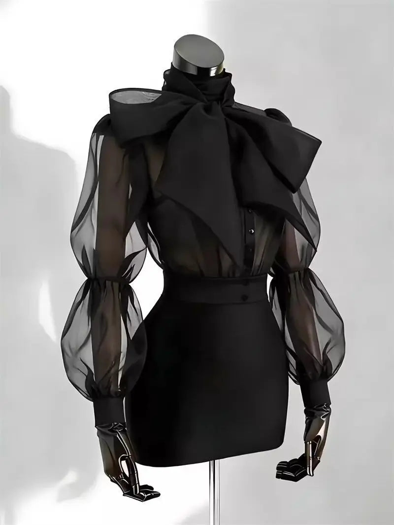 Camicia in tulle trasparente con fiocco e maniche a palloncino Gildga – Nera