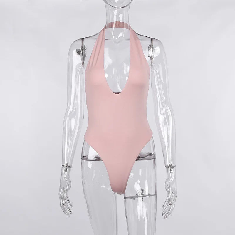 Costume intero Fariala — nero scollo profondo su modella | Dream Shop