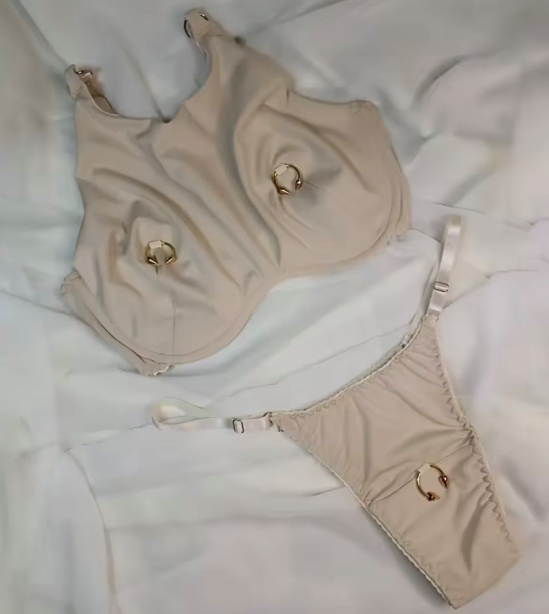 Bikini nipple piercing