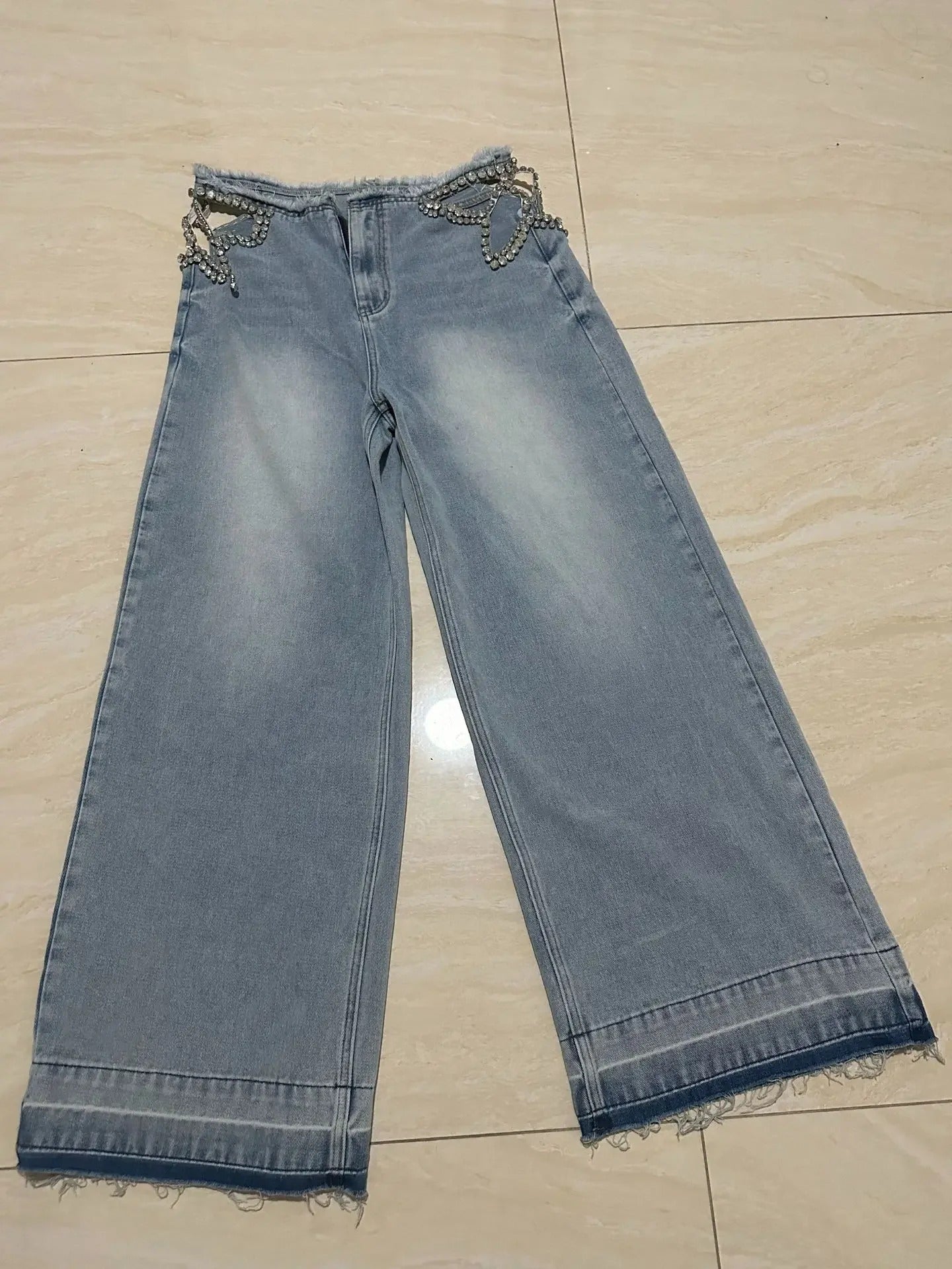 Jeans stella strass denim azzurro disteso lunghezza intera | Dream Shop