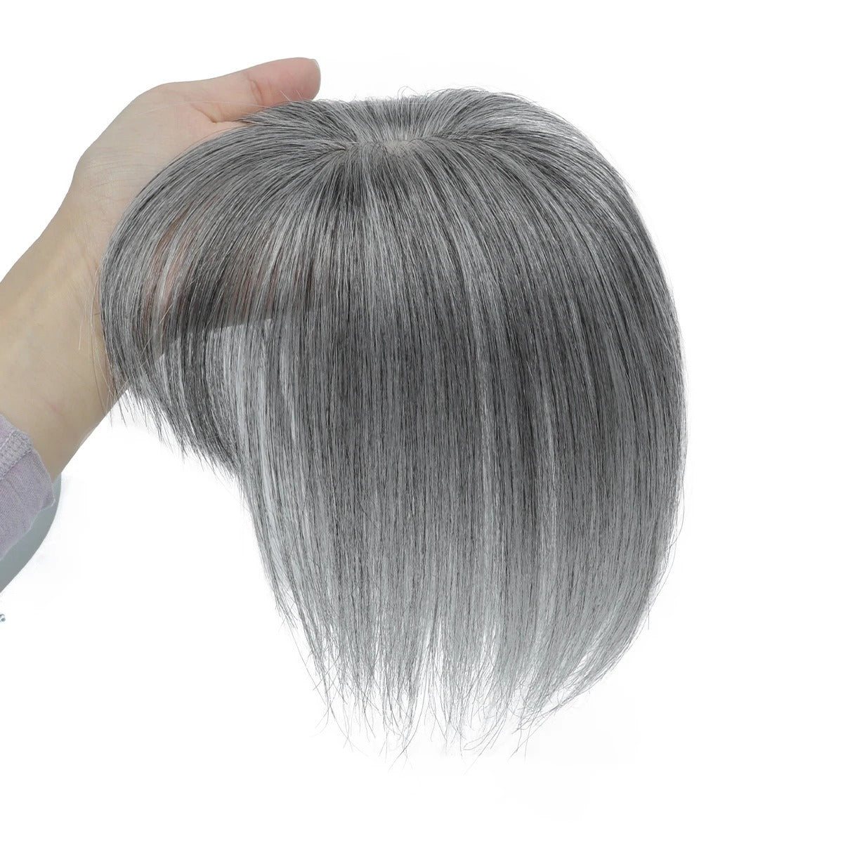 Human hair topper with bangs grey held in hand | Dream Shop
